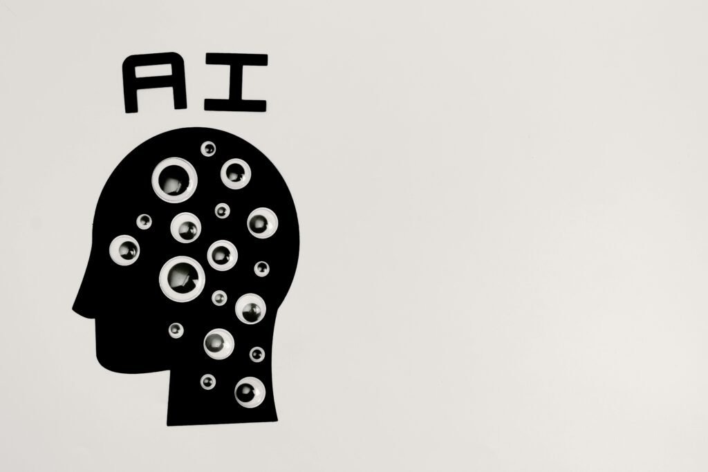 Ilustração de silhueta de cabeça humana com olhos móveis representando inteligência artificial (IA)
